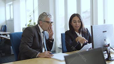 Confident female manager presenting report