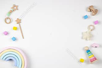 Baby kids toys frame on white background. Top view. Flat lay. Copy space for text