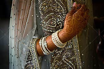 Detail shot of henna on Indian bride