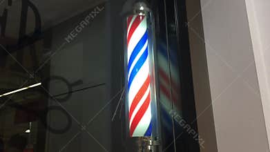 Barber shop pole sign outside