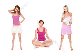 Three beautiful young women wearing pink and white summer clothes