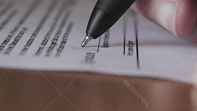 Signature on Contract by Pen in Hand. Write Business Agreement or Undersign Protocol of Convention. Close up. Move