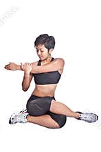 Fitness trainer doing stretching