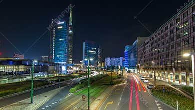 Milan skyline with modern skyscrapers in Porta Nuova business district night timelapse in Milan, Italy