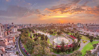 Aerial sunset view to Park of the Reserve with magic water circuit biggest fountain complex timelapse
