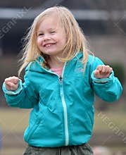 Portrait of happy little girl on St. Patrick`s Day