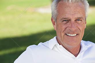 Happy Handsome Senior Man Smiling Outside