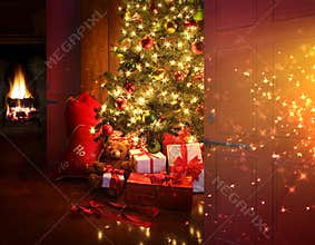 Christmas scene with tree and fire in background