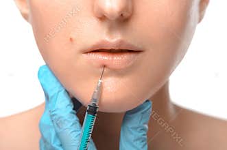 The girl gets the information to enlarge her lips in close-up