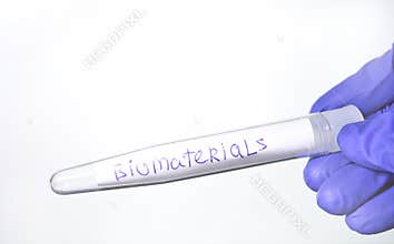 Test-tube for taking biomaterials in a doctor`s hand in medical glove on white background. Medical container for taking bio sample