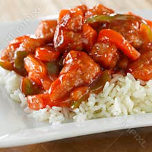Chinese food - sweet and sour chicken on rice