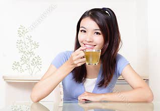 Beauty woman relax drink tea with home background