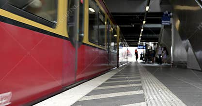 Platform in railway and sbahn or regional train then get on the train in Berlin, Germany.