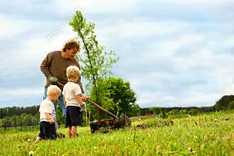 Family Planting Tree