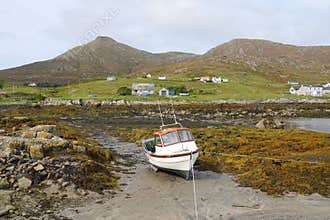 Boat at low tide on Scottish island