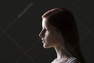 Serious Young Woman Looking At Copyspace