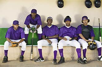 Baseball Players Sitting In Dugout