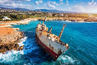 Abandoned Edro III Shipwreck at seashore of Peyia, near Paphos, Cyprus. Historic Edro III Shipwreck site on the shore of the water