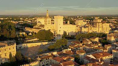 View of Avignon with Palais des Papes during sunset in Southern France. Medieval architecture along the Rhone River in Avignon,