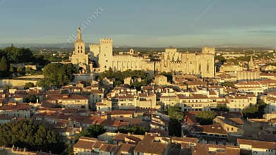 View of Avignon with Palais des Papes during sunset in Southern France. Medieval architecture along the Rhone River in Avignon,