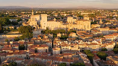 View of Avignon with Palais des Papes during sunset in Southern France. Medieval architecture along the Rhone River in Avignon,