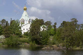 Nikolsky Skete of the Valaam Monastery among the trees