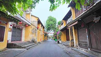 4: Scenic morning of trafic, decorated silk lanterns, amazing traditional old yellow houses.