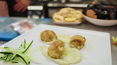 Swordfish Meatballs on a Base of Potato Puree and Crispy Courgettes Dish