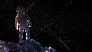 Rear view of back lit astronaut in space suit.
