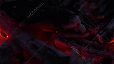 Glowing Charcoal and Ashes After Dark.