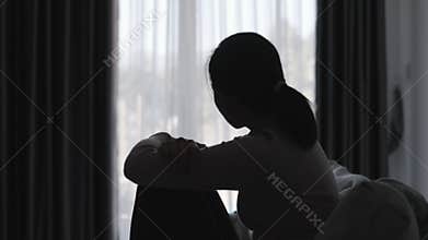 Shadow of a woman. She is depressed and depressed. There are problems. Accumulated stress relationship problems and emotional