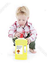 Child playing with toxic cleaner