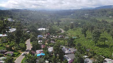 Beautiful scenery with small village amidst the beautiful tea hills