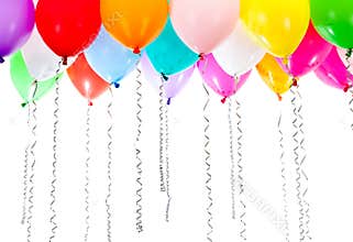 Colorful balloons with streamers on birthday party