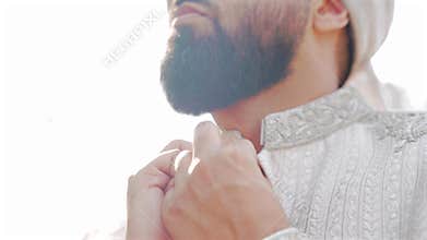 Inside the Indian wedding, the bridegroom brides together and worships the Lord. Happy indian groom handsome portrait