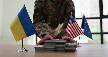 Military officer gives money for needs of Ukrainian army