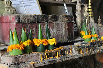 offerings at the pak ou caves closed to luang prabang (laos)