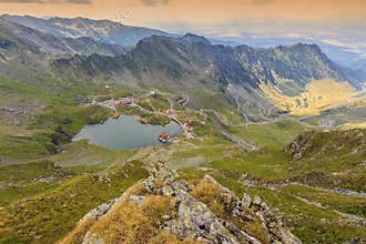 Alpine lake and curved road in mountains,Transfagarasan,Fagaras mountains,Carpathians,Romania