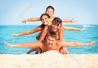 Family Having Fun at the Beach