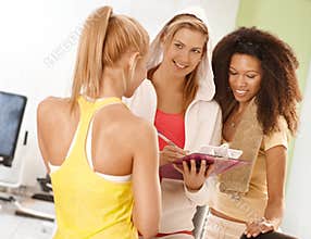 Happy girls at the gym