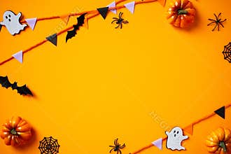 Halloween frame border featuring bunting garland, ghosts, black spiders, pumpkins, and bats on orange background