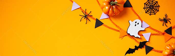 Halloween banner design with bunting, spiders, ghosts, bats, pumpkins on orange background