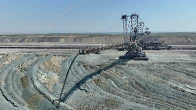 Top shot of a large bucket-wheel excavator in a lignite (brown-coal) mine. ?erial view.