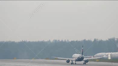 Airplane Airbus A321 of Aeroflot taking off, rear view