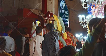 Agra, Uttar Pradesh, India. Indian Hindu Wedding Procession Of Baraat, With Bridegroom On Horse, Led By Brass Band