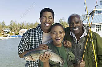 Happy Family With Fishing Rod And Fish