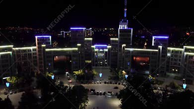 Aerial night illuminated Derzhprom building scene
