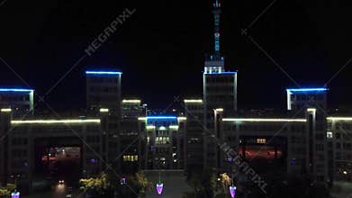 Aerial night illuminated Derzhprom building scene