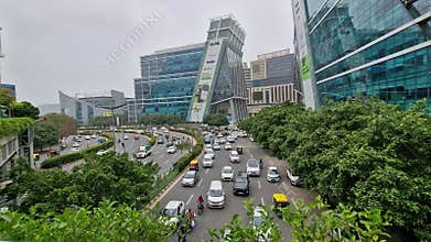 5-07-24 Modern buildings surrounded by four-lane roads in Cyber City, Gurgaon.