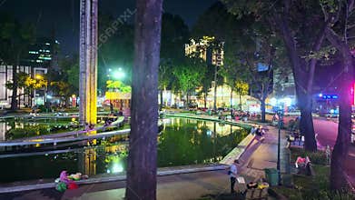 Nighttime cityscape on double decker bus